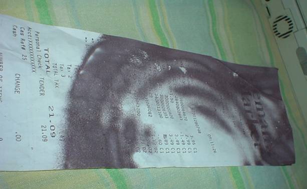 Darkened thermal paper receipt 1
