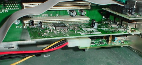 Highpoint RocketU USB 3.0 card installed underneath a PCI Firewire card.