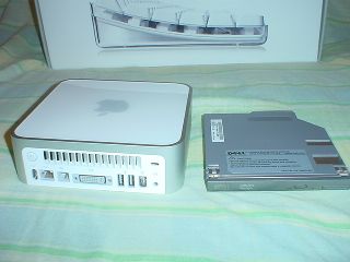 Dell DVD/CD-RW module next to Mac Mini for height illustration